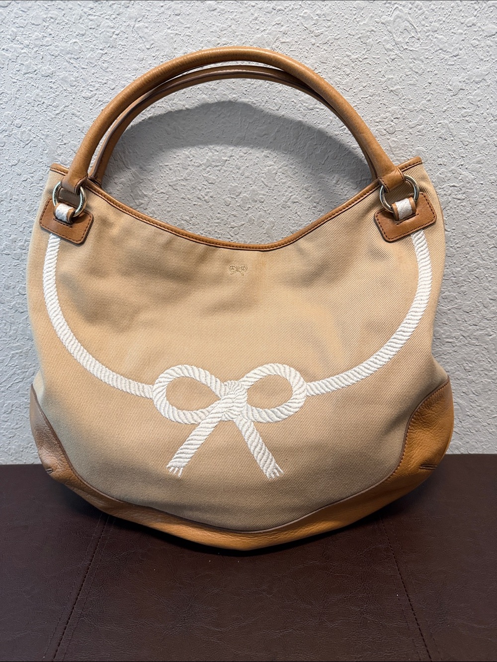 Anya Hindmarch Leather-Trim Canvas Hobo Bag in Tan with White Rope Embroidery